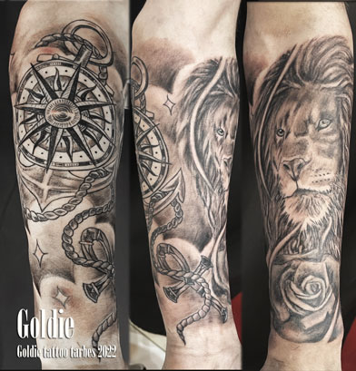 GODIE-Goldie-tattoo2022web-avant-bras-lion-et-boussole-noir-et-gris.jpg